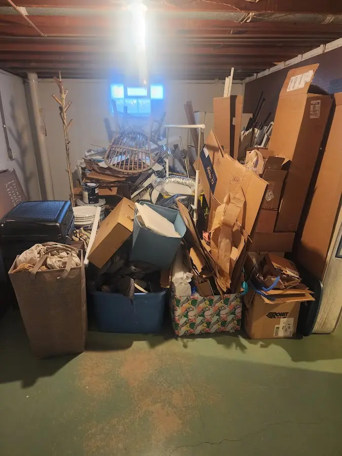 Roll-off dumpster container at job site for 4 Yard Dumpster Rental in Bennington